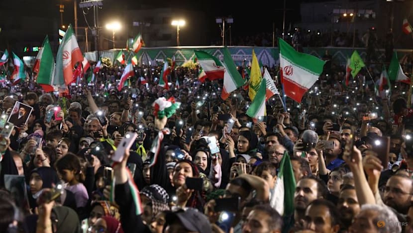 Iran hold World Cup departure rally despite continuing concerns