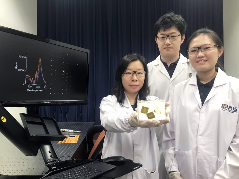 Assistant Professor Shao Huilin (left) from the National University of Singapore's Institute for Health Innovation & Technology, with two other members of the research team that developed the blood test to detect Alzheimer's disease.