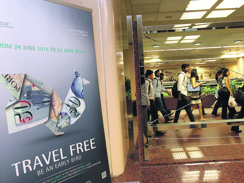 A travel-free placard at Raffles Place MRT Station. The one-year trial will begin on June 24. Photo: Ooi Boon Keong