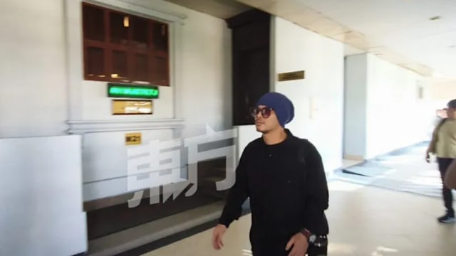 尿检呈阴 黄明志无罪释放