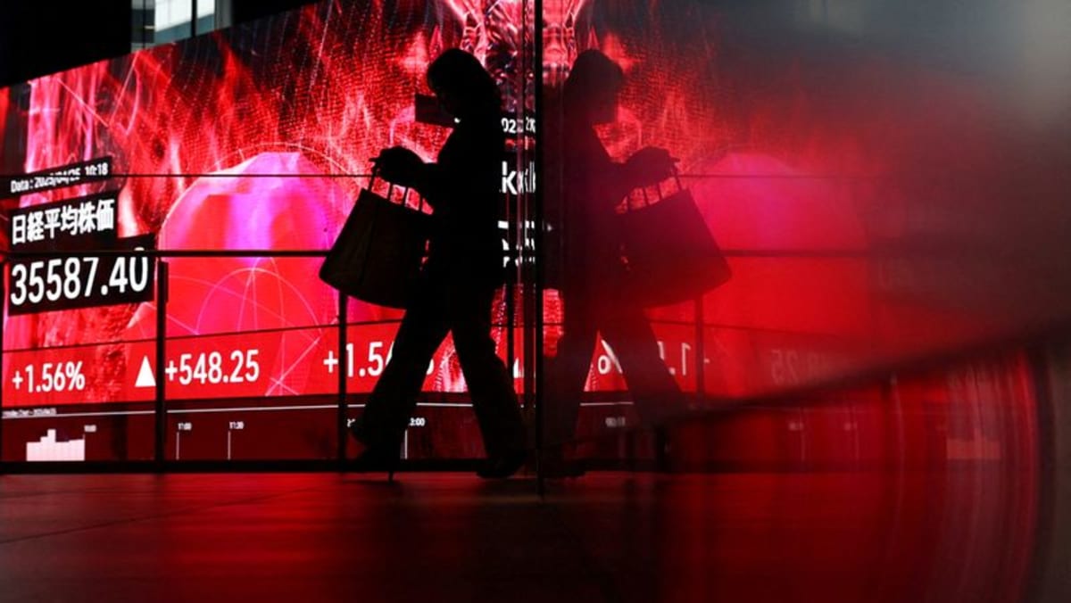Stocks stall, yen slides as BOJ adds to growth gloom - Channel News Asia (Picture 1)