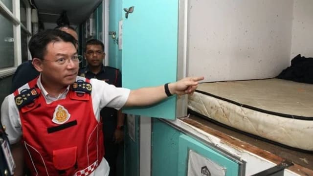 三层楼店屋隔成78小房间 马国部长：就像放尸体的地方