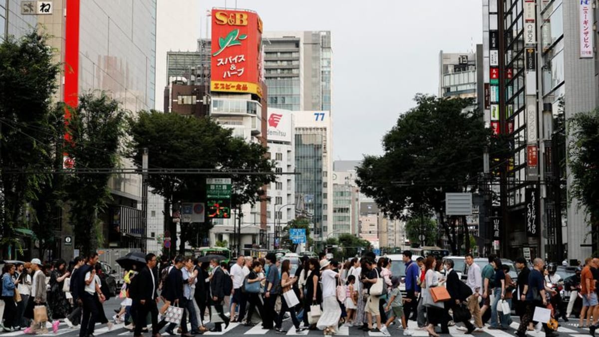 Japan more upbeat on consumption, exports in June economic report