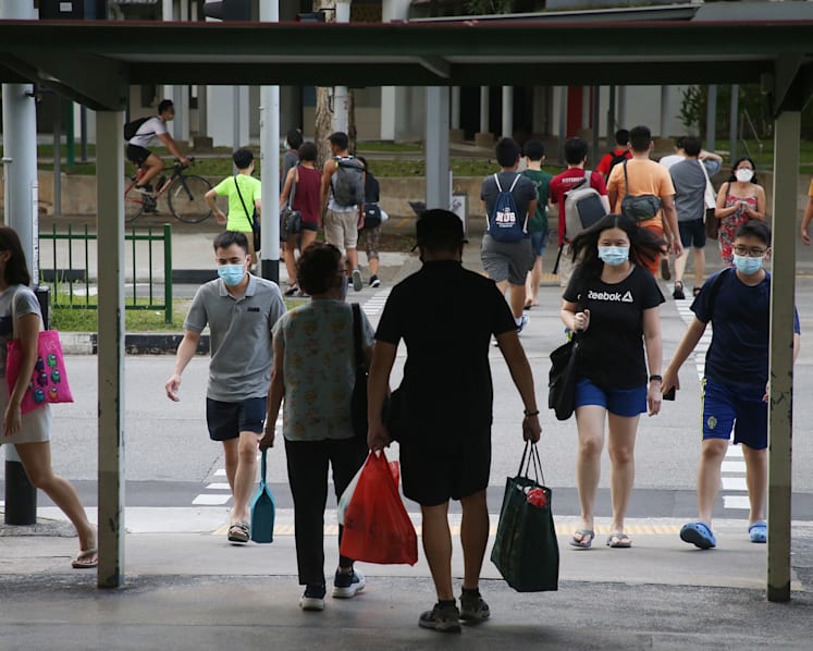 Singapore reports 7,584 new Covid-19 cases, 13 deaths