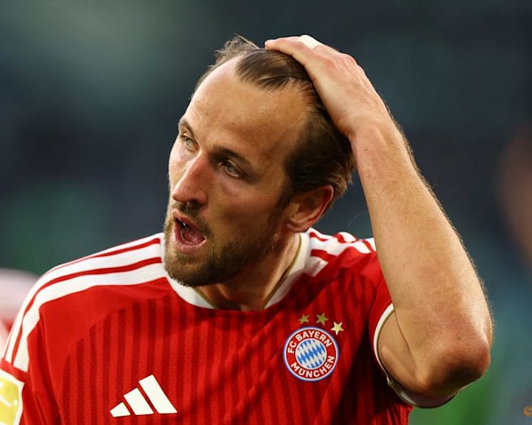 Bayern scrape win despite Kane penalty miss after Champions League exit