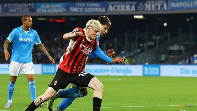 Napoli claim 2-1 win over Milan to keep pace in title race Napoli claim 2-1 win over Milan to keep pace in title race