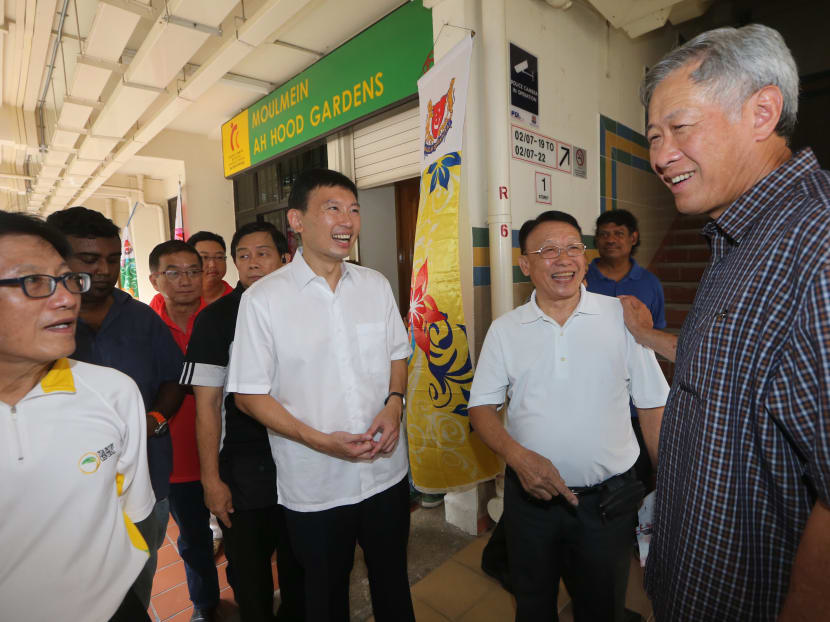 Defence Minister and MP for Bishan-Toa Payoh Ng Eng Hen prepares for house visits with Mr Chee Hong Tat at Blk 106, Jalan Dusun on 10 Aug 2015. Photo: Ooi Boon Keong