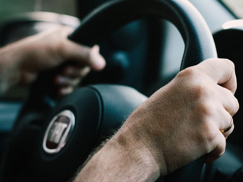 A photo of a person driving.