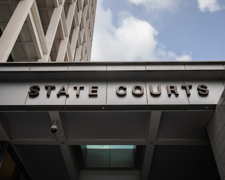 Ex-NTUC FairPrice employees charged with taking over S$500,000 in bribes from fish suppliers