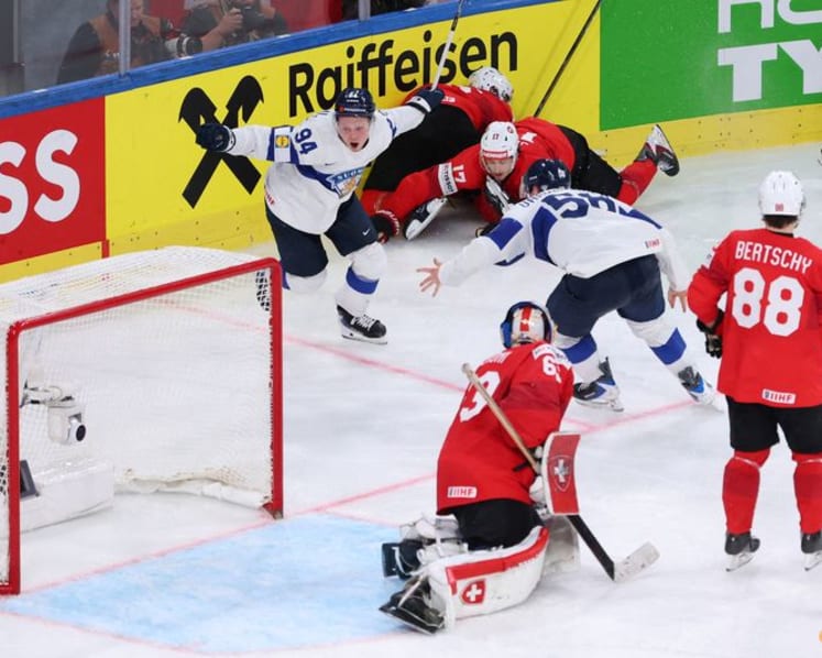 Ice hockey-Helenius is the hero as Finland beat Swiss in world final