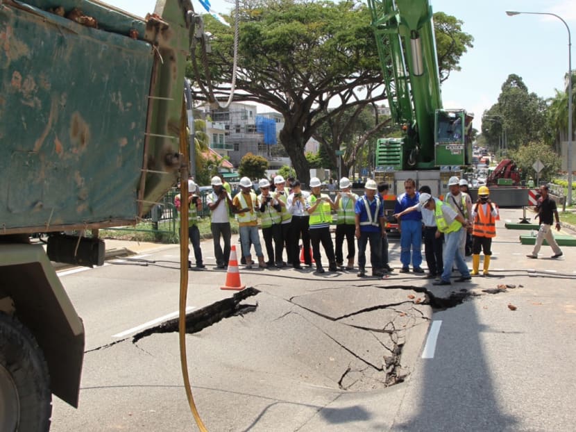 Truck sinks into ground along Upper Changi Road East