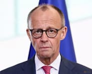 German chancellor downplays row with Trump after troop drawdown announced
