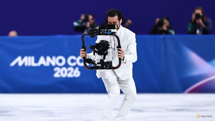 Figure skating-On-ice cameraman brings new Olympic angle