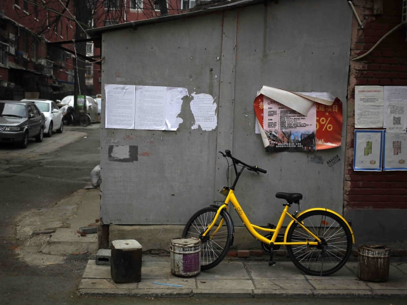 Bike-sharing rivalry crowds Beijing’s sidewalks