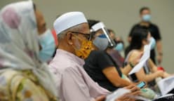 Commentary: What’s behind no-shows in vaccination centres across Malaysia?