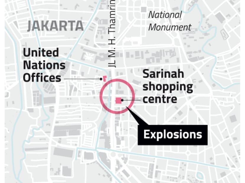 Seven dead in Jakarta blasts, gunfight