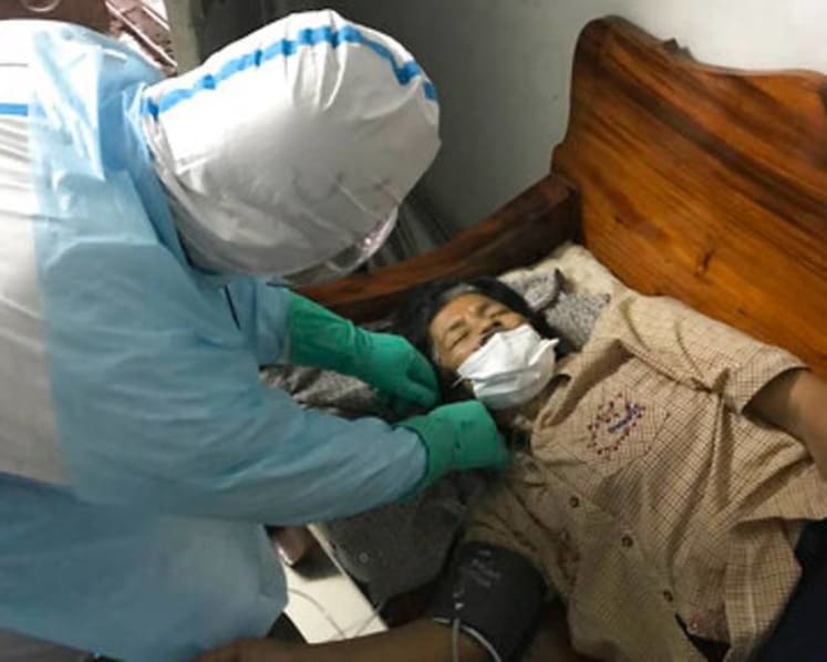 Thai volunteers aid COVID-19 patients in need of care, testing