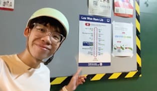 He puts up his own wayfinding signs to help commuters in Singapore