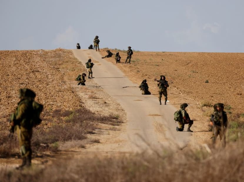 Gazans await 'life and death' aid, Israel readies invasion