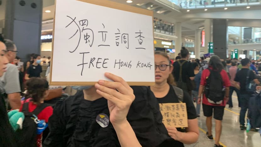 As fresh protest hits airport, Singaporeans in Hong Kong feel tensions but say life goes on as usual