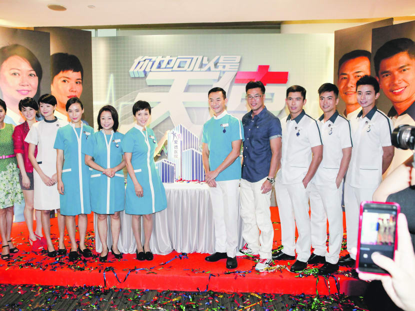 Elvin Ng and Rebecca Lim start their shifts