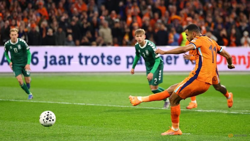 Dutch ensure World Cup qualification with 4-0 win over Lithuania