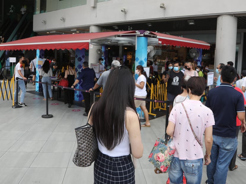 Due to checks on vaccination status, a long line of people were waiting to enter Tampines Mall on Oct 13, 2021. Due to checks on vaccination status, a long line of people were waiting to enter Tampines Mall on Oct 13, 2021.