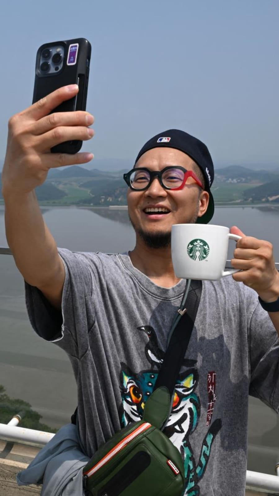 Coffee with a view: Tourists flock to Starbucks overlooking North Korea