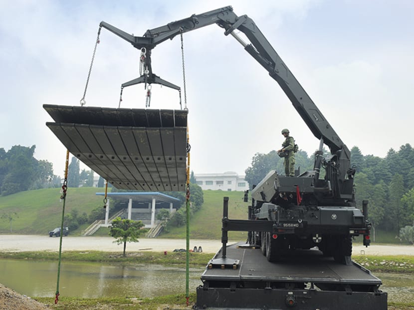 A Foldable Longspan Bridge crew in action. Photo: MINDEF