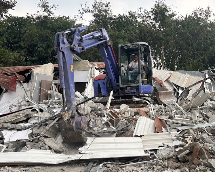 Indonesian authorities demolish luxury prison 'villas' where whisky, TVs seized