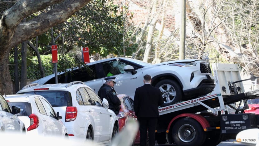 Man arrested after car crashes into Russian consulate in Sydney