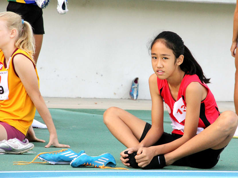 Tia Louise Rozario cleared 5.23m in the Girls C Division long jump to set a 
new record. 
Photo: Jenny Lim
