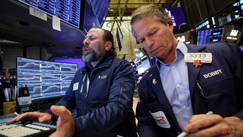 US stocks close below record highs, world indexes set for double-digit 2025 gains