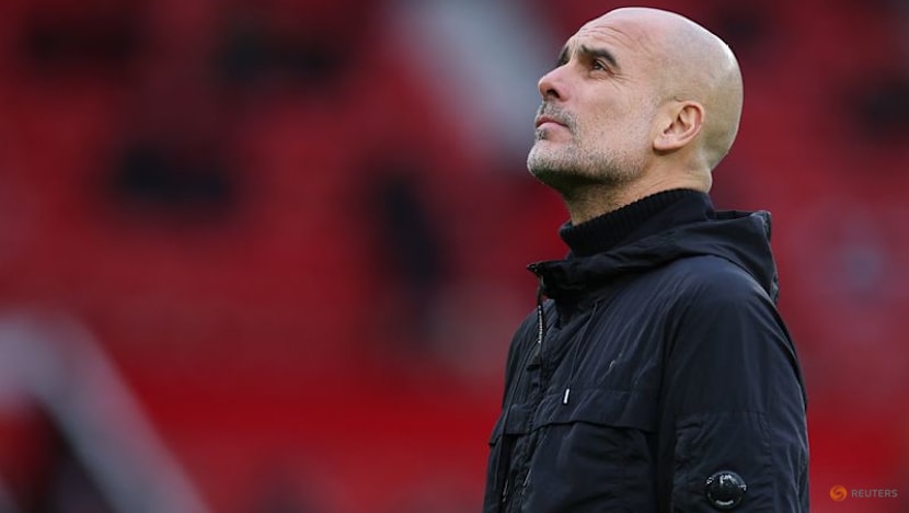 City's Guardiola shrugs off tightening title race, saying 12 games is an eternity