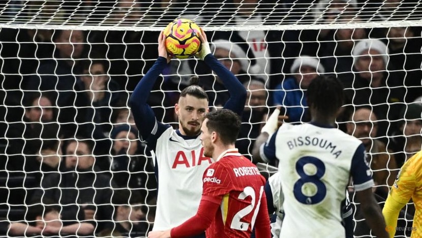Liverpool hit Tottenham for six to cement top spot, Chelsea held