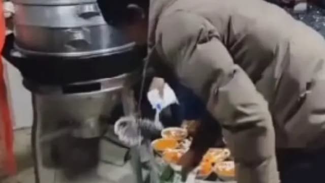 为阻村民办满月酒 中国官员在食物上撒盐引争议
