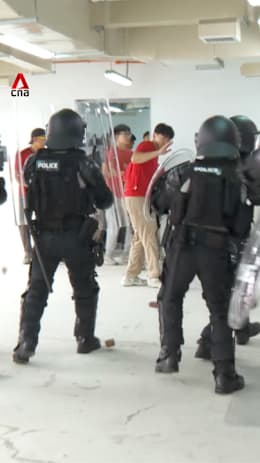 How Singapore police officers stay calm when things get violent