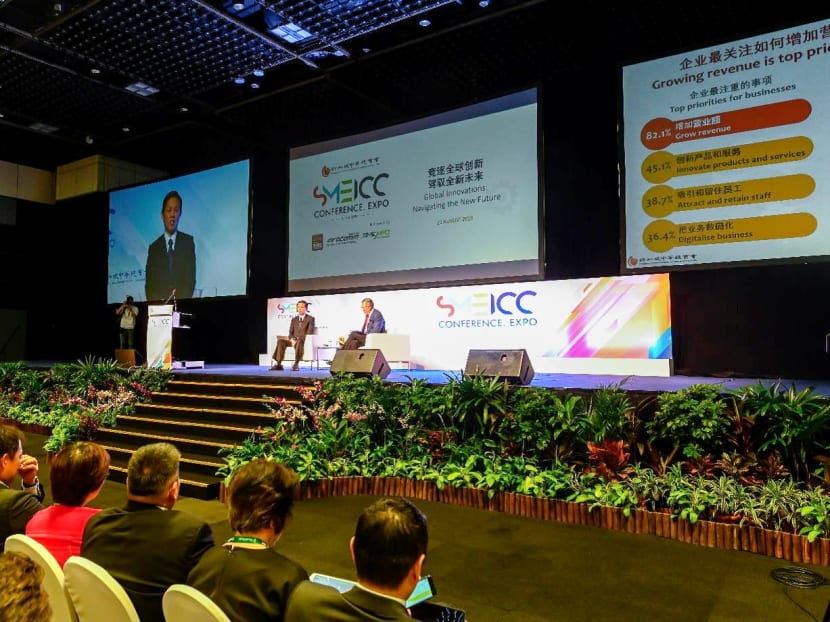 Trade and Industry Minister Chan Chun Sing (on stage, left) speaking at the 21st Annual SME Conference organised by the Singapore Chinese Chamber of Commerce and Industry. Trade and Industry Minister Chan Chun Sing (on stage, left) speaking at the 21st Annual SME Conference organised by the Singapore Chinese Chamber of Commerce and Industry.