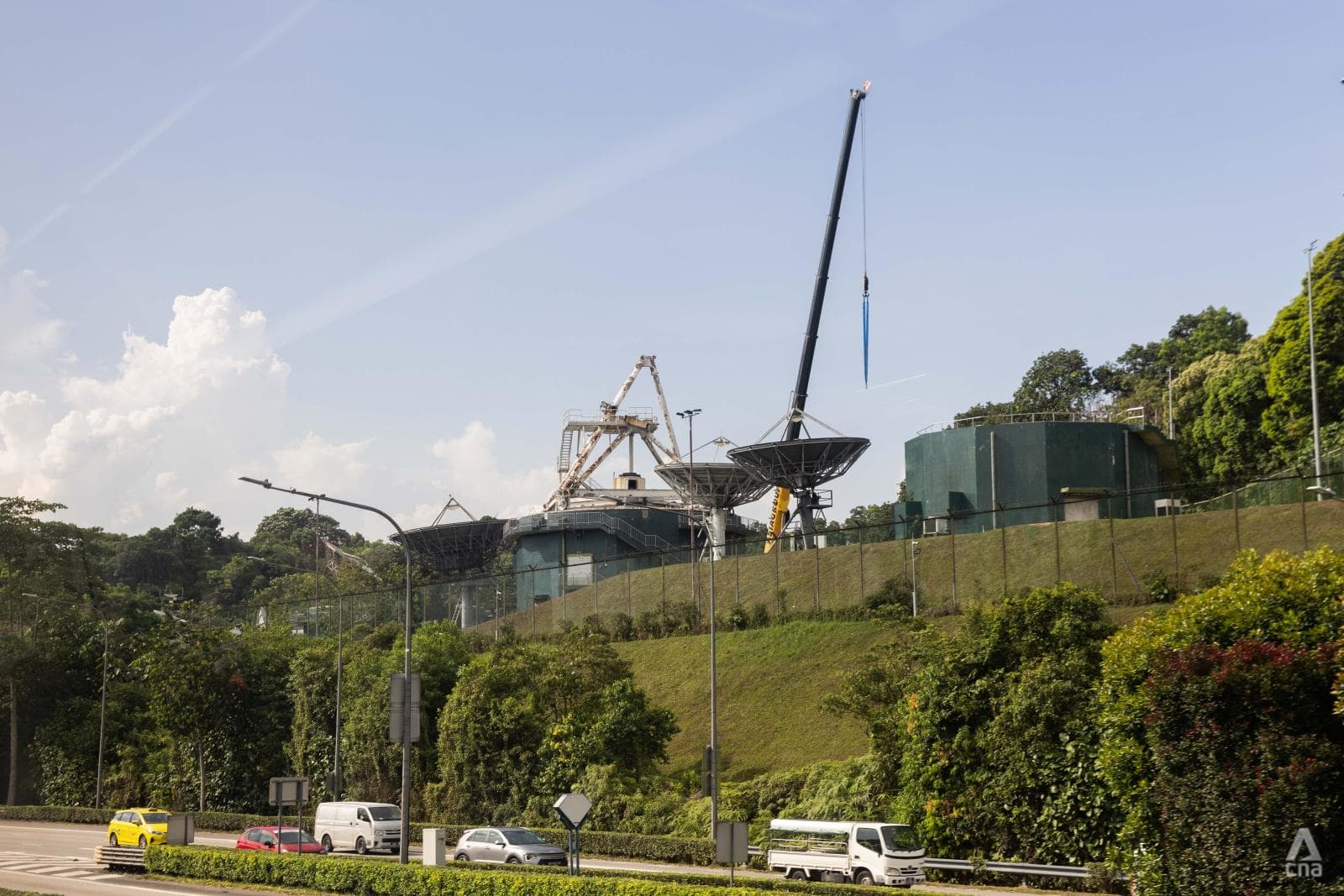 channelnewsasia.com - Two landmark satellite antennas removed from Bukit Timah Satellite Earth Station