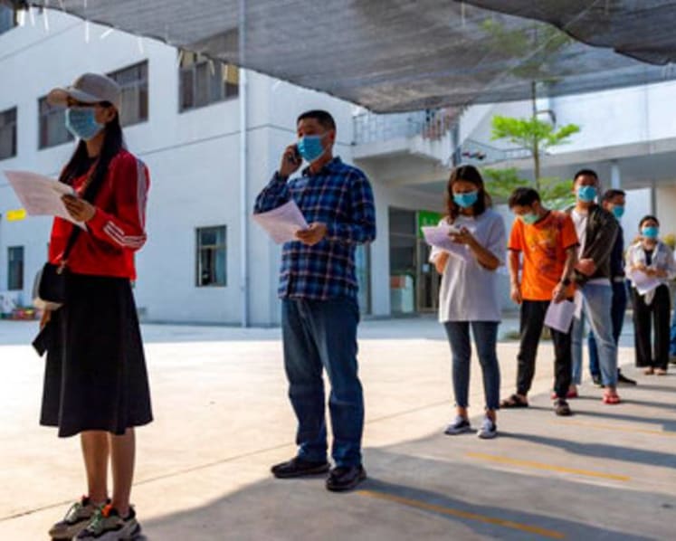 China aims to vaccinate entire city in 5 days after outbreak