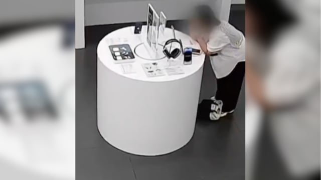 福建女子嫌苹果手机太贵 直接咬断防盗线偷走