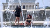 US cities face record high temperatures on worst day of heatwave