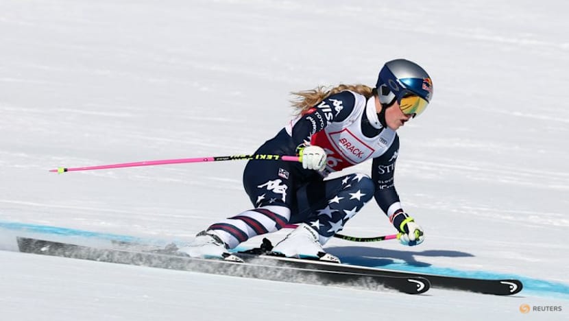 Alpine skiing-Vonn wins again at 41 to make history in St Moritz downhill