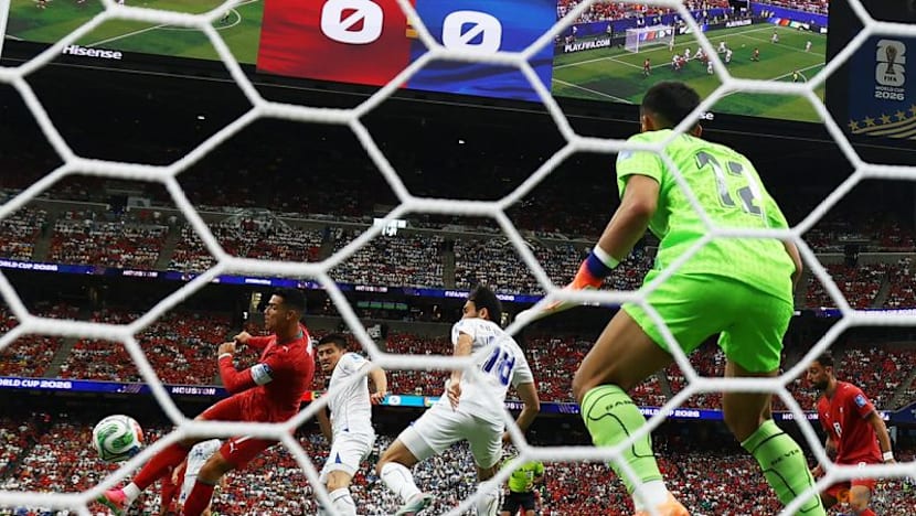 Record-breaker Ronaldo guides Portugal to 5-0 win over Uzbekistan