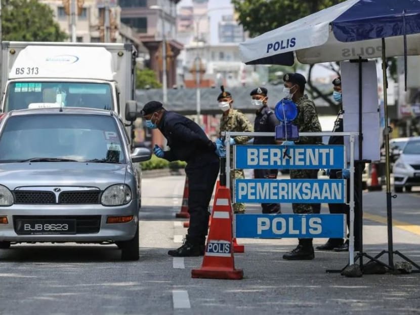 The two women claimed that they were stopped at a roadblock in the district while they were on their way home in a car they hired through the e-hailing app Grab.