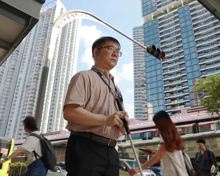 What one man is teaching Singaporeans about living with the visually impaired – a crossing, a tour, a firm ‘no’ at a time