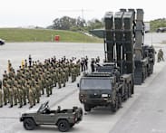 Japan's Cabinet approves record defence budget that aims to deter China