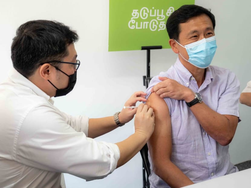 Health Minister Ong Ye Kung (right) receiving the Moderna-Spikevax bivalent Covid-19 vaccine from Dr Ong Guan Hong, medical director of Pancare Medical, on Oct 11, 2022. Health Minister Ong Ye Kung (right) receiving the Moderna-Spikevax bivalent Covid-19 vaccine from Dr Ong Guan Hong, medical director of Pancare Medical, on Oct 11, 2022.