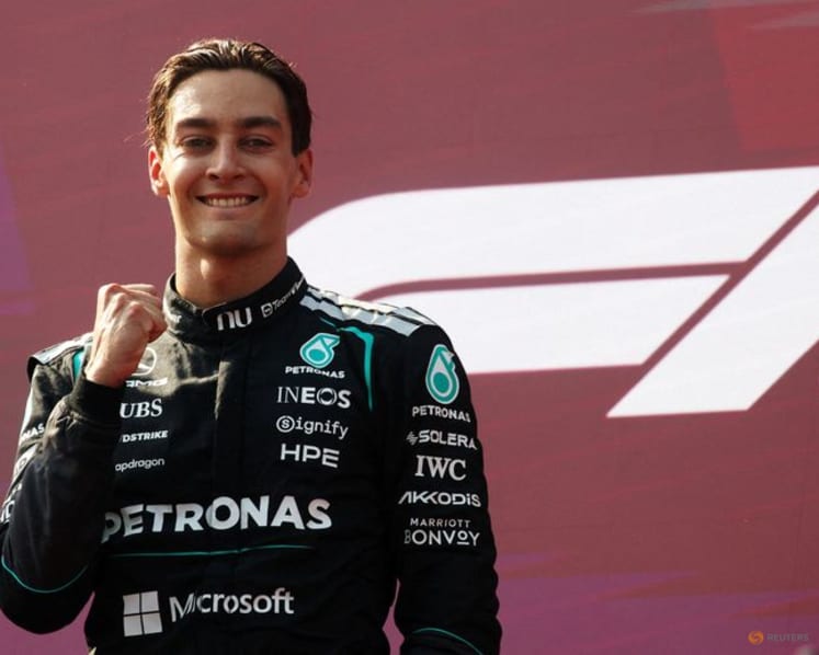 Russell ends long wait with 'cold-blooded' win