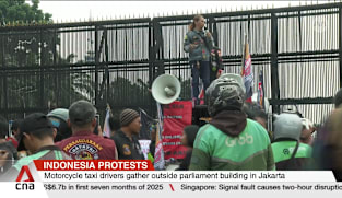 Indonesian drivers gather outside parliament to demand stronger protection for gig workers